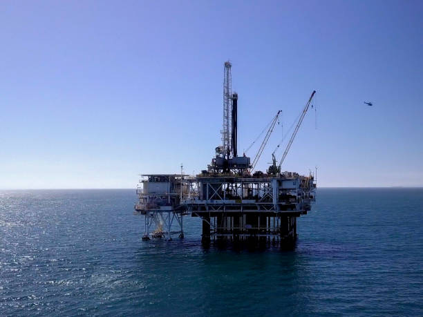 istock Offshore Hydraulic Fracturing or Fracking Oil Rig Platform 1054857446