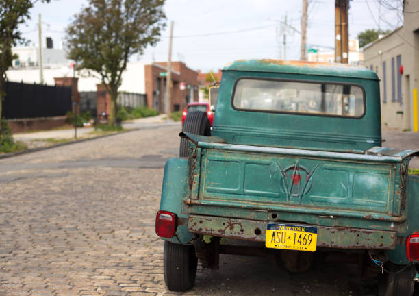 Red Hook, Brooklyn, NY: Vintage Willys Pickup on Cobbled Street stock photo