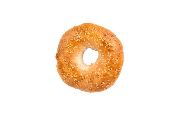 istock Bagel with sesame seeds, directly above. 1054864272