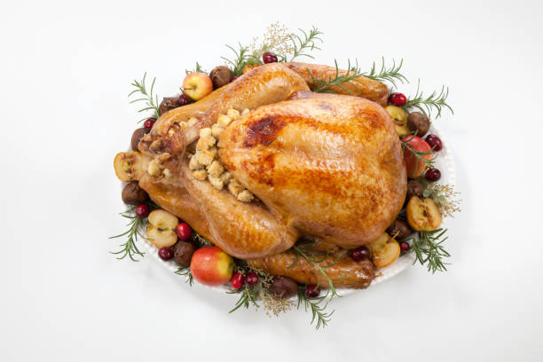 istock Roasted Turkey with Grab Apples over white 1054874720
