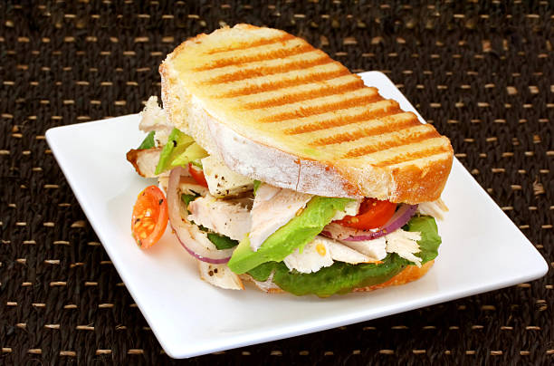 istock Grilled chicken panini with lettuce and tomato 105487659