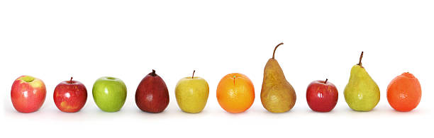 istock Various kinds of fruits lined up on white background 105487680