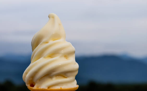 istock A delicious vanilla ice cream in a cone with copy space on the right 1054877832