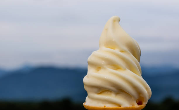istock A delicious vanilla ice cream in a cone with copy space on the left 1054877834