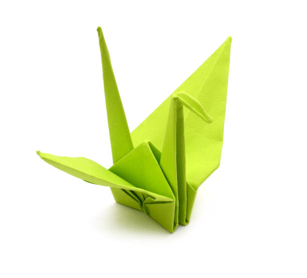 istock Origami green bird paper 1054886488