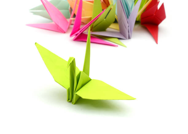 istock Group Of Origami Birds 1054886496