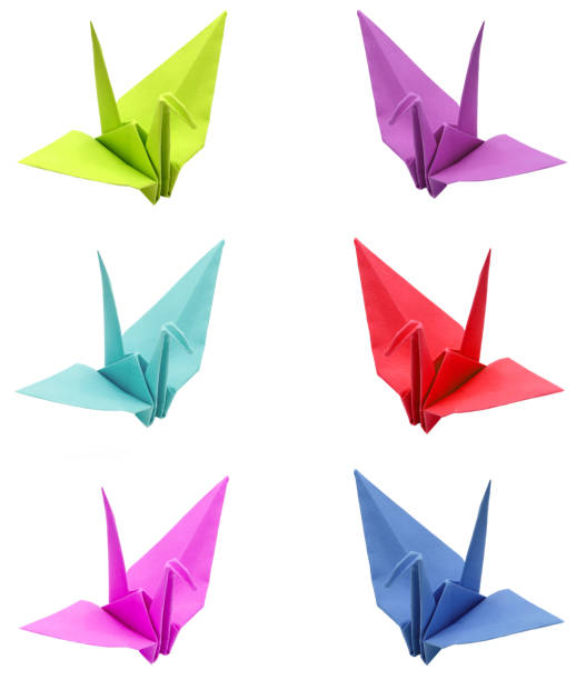 istock Colorful japan origami crane bird isolated 1054886608