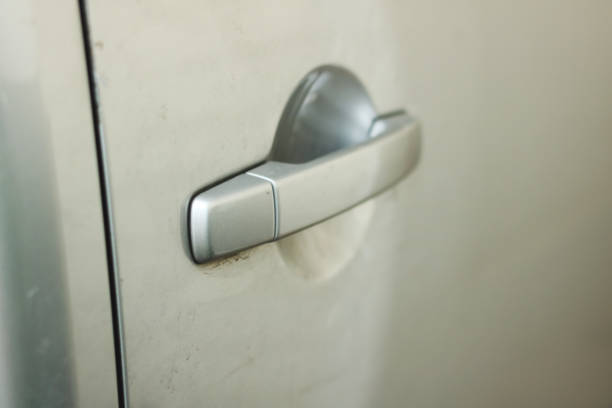 istock Close up of car door handle. 1054887836