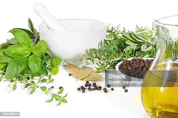 Mortar And Pestle With Fresh Herbs Stock Photo - Download Image Now - Basil, Bay Leaf, Bouquet Garni