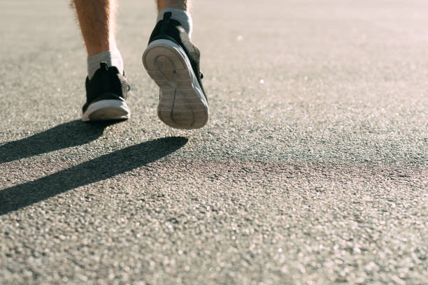 istock runner jogging shoes track field athletics sport 1054898902