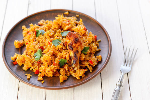 istock fried rice with chicken on a wooden table 1054899072