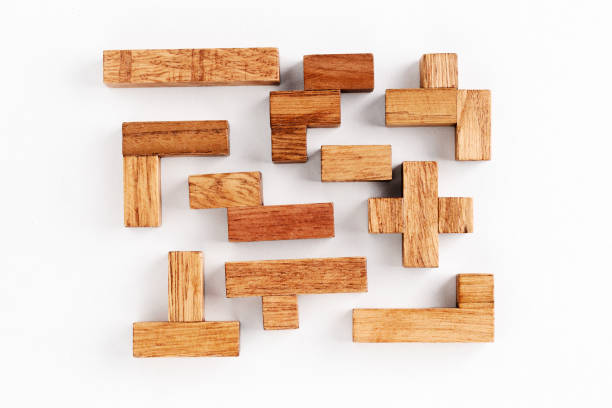 istock Different shapes wooden blocks on white background 1054899190