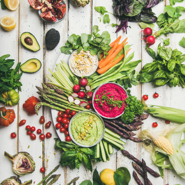 Chickpea, beetroot and spinach humus dips with fresh vegetables