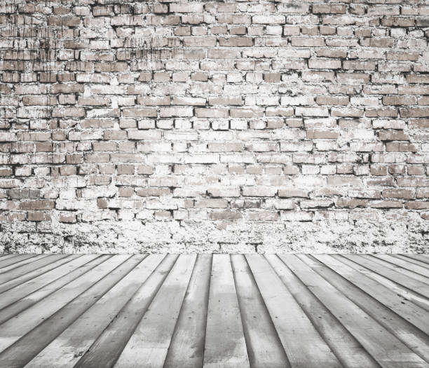 istock old white room with brick wall, vintage background 1054906960