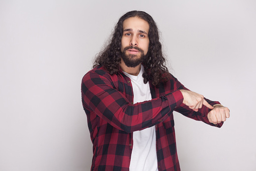 We Have No More Time Serious Man With Beard And Black Long Curly Hair In Casual  Style Checkered Red Shirt Standing Showing Time Gesture And Worry Stock  Photo - Download Image Now -