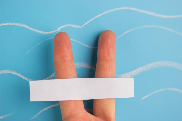 istock save the ocean concept. two fingers with sing save the ocean 1054908238