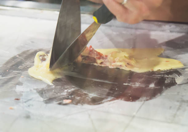 istock Making of fried ice cream in cafe. 1054910554