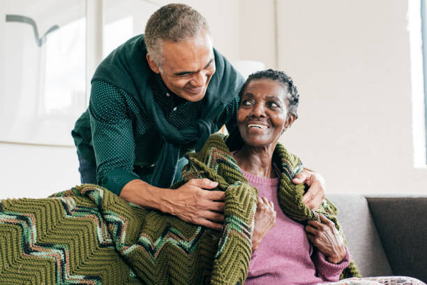 son visiting  mother in retirement home - dementia imagens e fotografias de stock