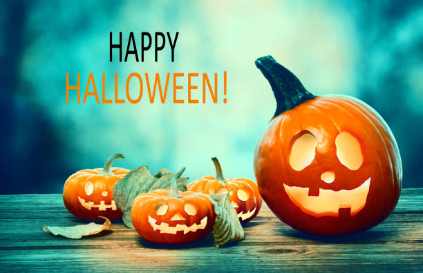 istock Happy Halloween with pumpkins at night 1054915158