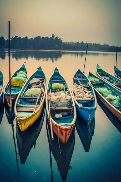 istock Wooden boats on river water 1054915360