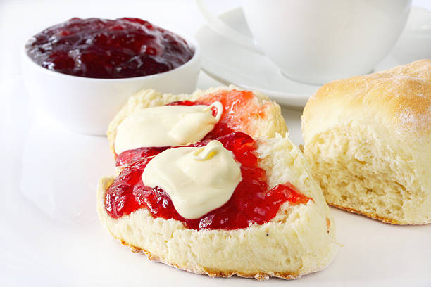 istock Close-up of scones with butter and jam 105491637