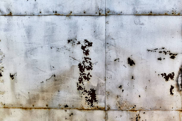 istock The wall is sheathed by rusty sheets of metal. 1054920284