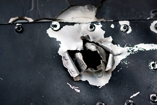 istock Bullet hole in a WWII air plane 105492065