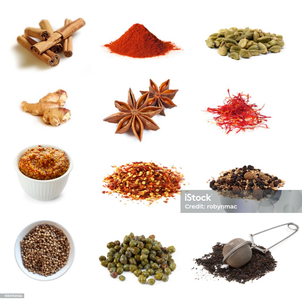 Spices Collection Collection of spices, isolated on white.  Includes cinnamon, paprika, cardamom, ginger, star anise, saffron, mustard, chili flakes, pickling spices, coriander, capers, and black tea.  More herbs and spices:   http://robynm.smugmug.com/photos/265712091_f6Mdn-L.jpg Caper Stock Photo