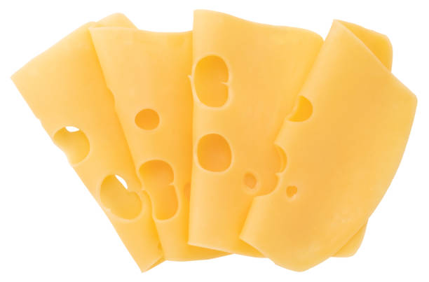 istock cheese slices isolated on white background, top view 1054924704