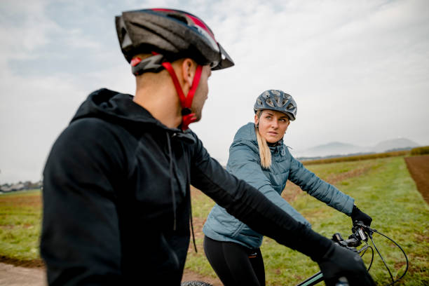 istock Young couple with mountain bike 1054927082