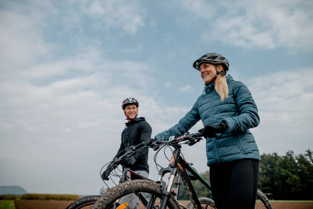 istock Young couple with mountain bike 1054927088
