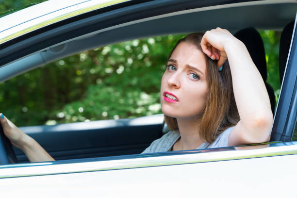 istock Stressed young woman upset about traffic 1054927674