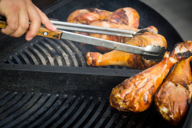 istock Barbecue Turkey Legs on the grill 1054928148