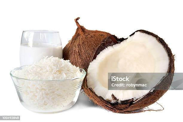 A Glass Of Coconut Milk And A Bowl Of Desiccated Coconut Stock Photo - Download Image Now