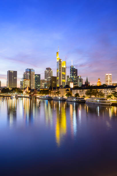 istock Frankfurt City Skyline and Main River Reflection Illuminated at Twilight, Germany 1054940690