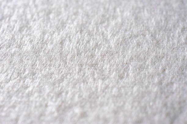 istock Extreme close-up of white fabric texture background. 1054942062