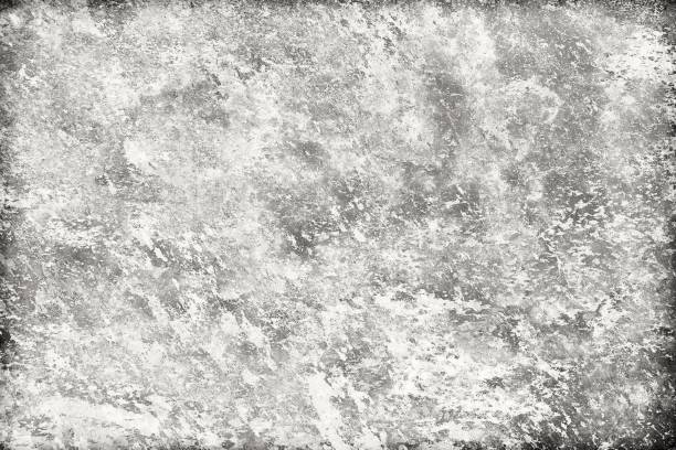 istock Grunge texture black and white. Old vintage surface with scratches and scuffs. Abstract background 1054944628