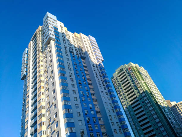 istock Multi-colored high-rises on the background of sky 1054945538