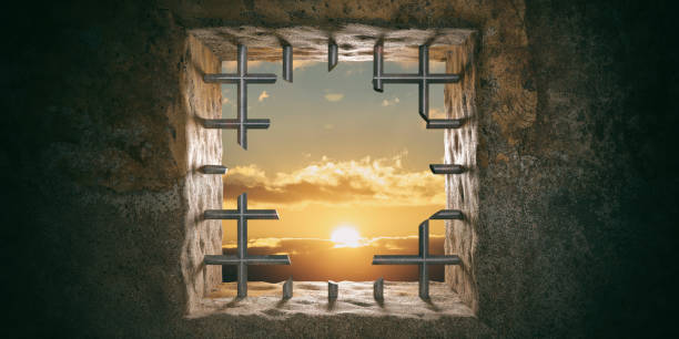 istock Escape, freedom. Prison, jail window with cut bars, sunset, sunrise view. 3d illustration 1054945672