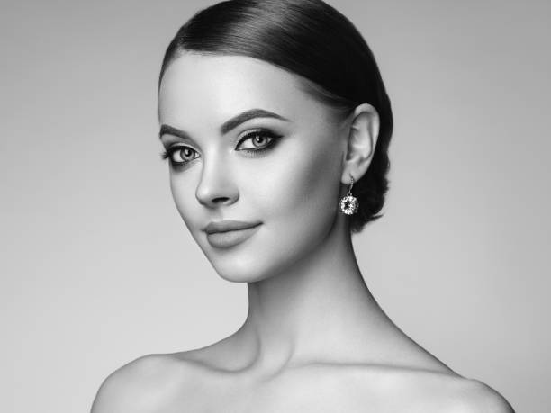istock Beautiful woman face with perfect makeup 1054949202