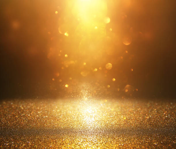 istock glitter vintage lights background. silver and gold. de-focused. 1054952326