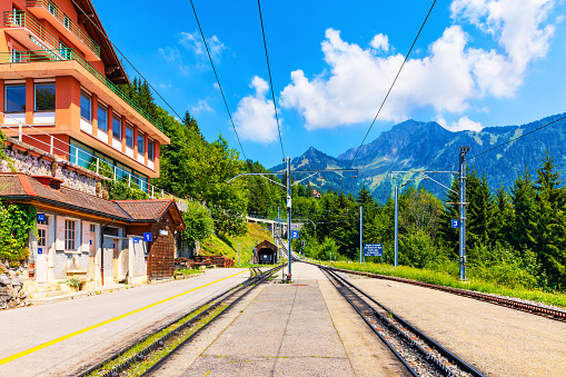 Scenic summer view of Caux cogwheel railway station on the way up to the Rochers de Naye mountain peak in Alps Mountains, Switzerland