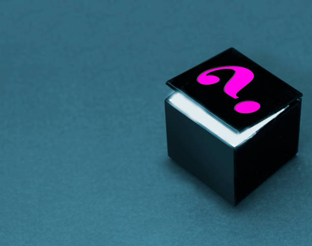 istock Concept for breast cancer or mystery: black box with pink question mark 1054956110