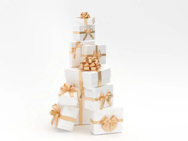 Photo of Gifts stack with golden ribbon