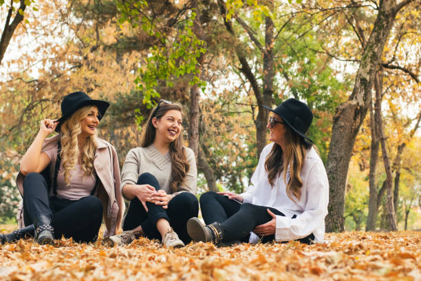 istock Best friends in park on a fall day 1054959816