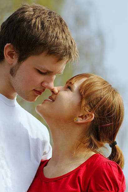 Young couple kissing stock photo