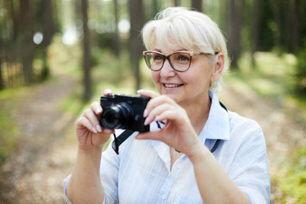 istock Woman photographing 1054962370