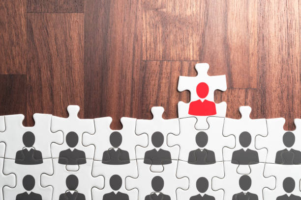 istock Team leader and leadership concept. Standing together. 1054965616