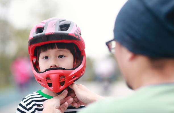 istock Father and Son Sports Safety 1054966722