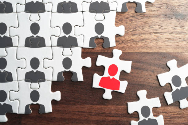 istock Human resource management. Selecting business person for organization. 1054967838